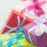 Close-up of vibrant gift boxes with ribbons, perfect for festive occasions.
